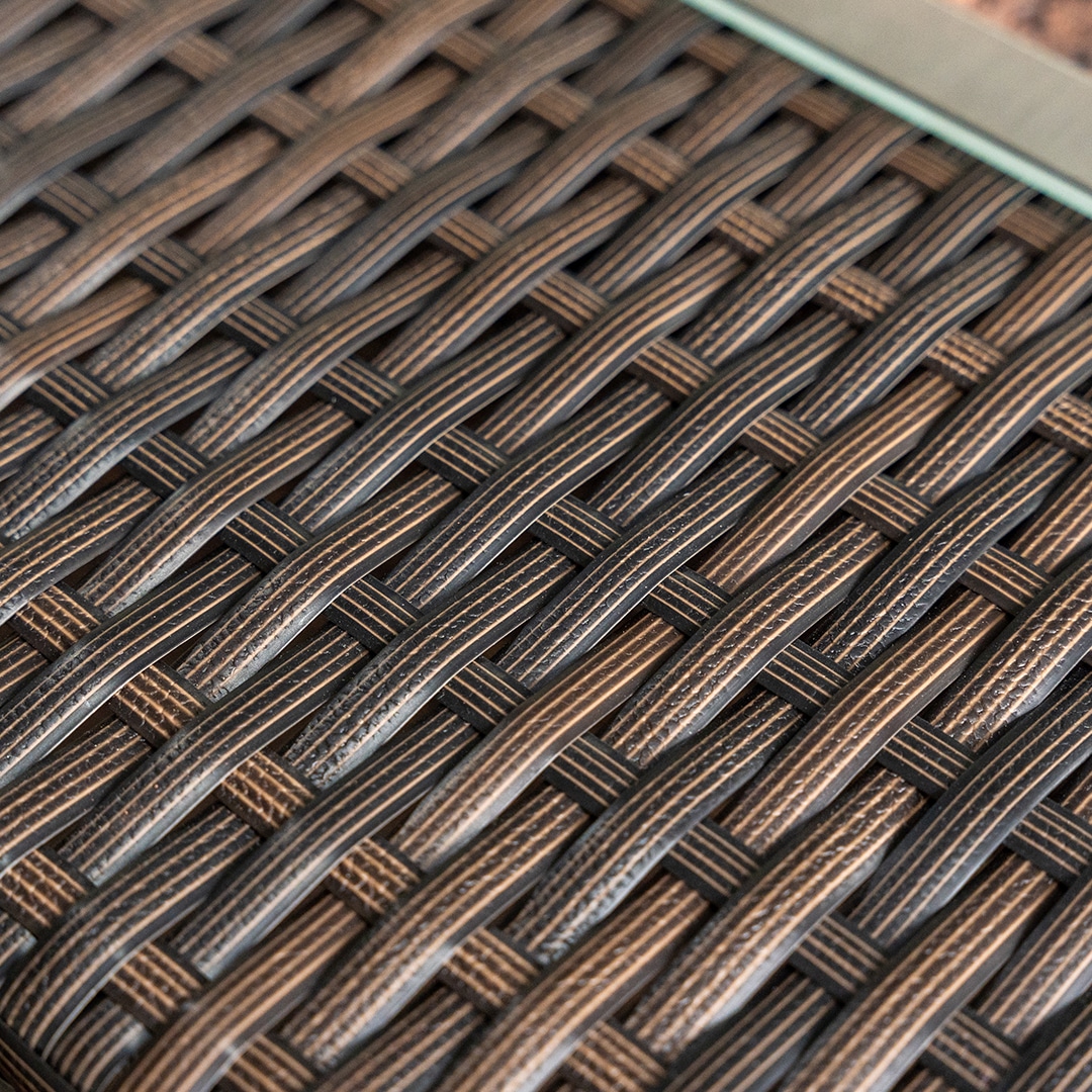 close-up of a brown rattan patio furniture base