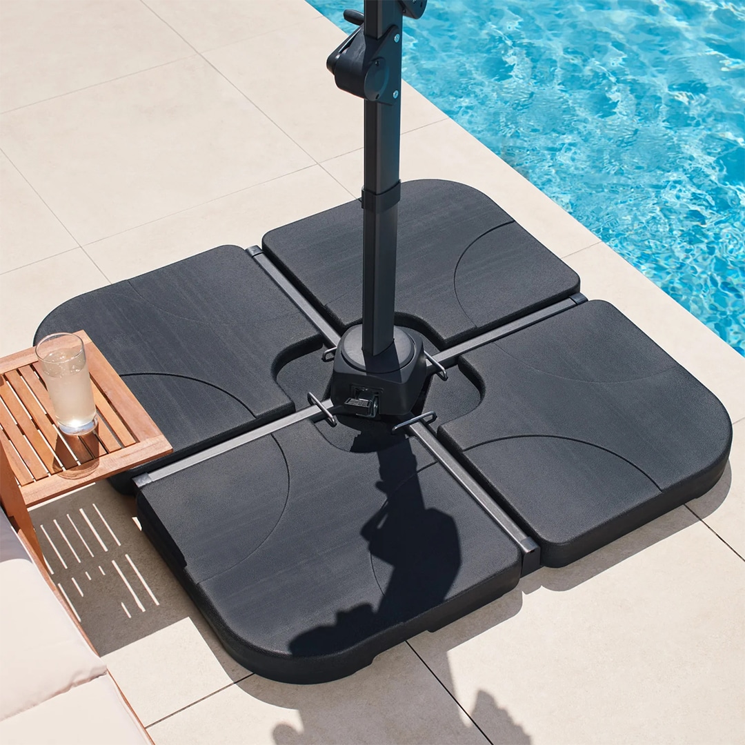 Patio umbrella base filled with water